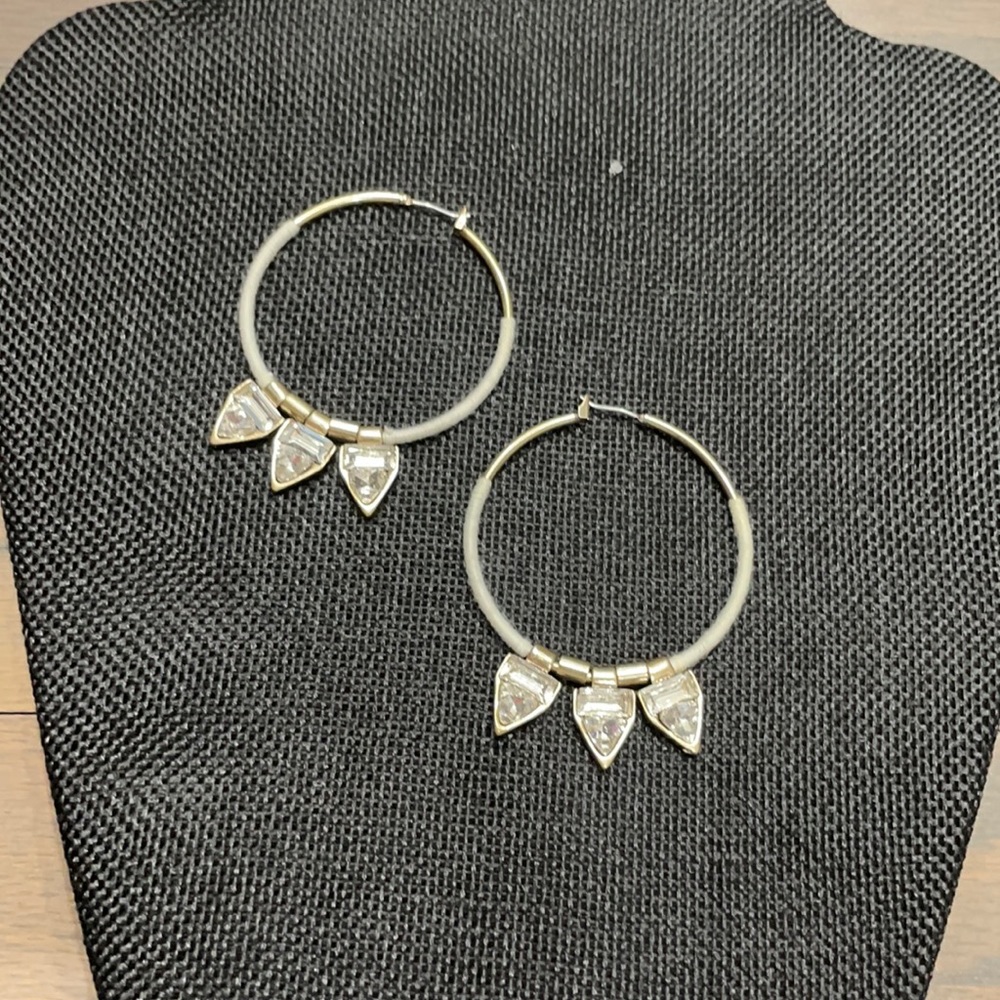 Gold hoop earrings with stones